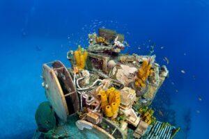 A boat with many pieces of junk on it